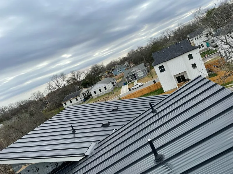 Standing seam metal roof panels with vents for Skylight Repair in West Des Moines